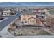 Aerial view of the house shows landscaping, fenced yard, and neighborhood setting at 7310 Blue Water Dr, Castle Rock, CO 80108