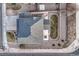 Aerial view showcases the home's layout, landscaping, patio, and the surrounding neighborhood at 7310 Blue Water Dr, Castle Rock, CO 80108