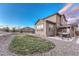 Landscaped backyard featuring a relaxing hot tub under pergola at 7310 Blue Water Dr, Castle Rock, CO 80108