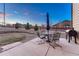 A patio featuring a table, chairs, and grill at 7310 Blue Water Dr, Castle Rock, CO 80108