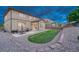 Spacious backyard with a manicured lawn, a comfortable patio, and well-maintained landscaping for outdoor living at 7310 Blue Water Dr, Castle Rock, CO 80108