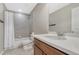 Cozy bathroom with shower and tub, vanity and commode at 7310 Blue Water Dr, Castle Rock, CO 80108