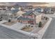 Beautiful two-story home with a spacious driveway and manicured front yard landscaping at 7310 Blue Water Dr, Castle Rock, CO 80108