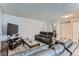 Relaxing living room with comfortable seating and ample space at 12504 E Cornell Ave # 103, Aurora, CO 80014