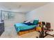 Main bedroom featuring large window and ample space at 12504 E Cornell Ave # 103, Aurora, CO 80014