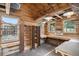 Versatile shed interior featuring natural wood, built-in work surfaces, and ample storage at 3272 S Joplin Ct, Aurora, CO 80013