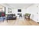 Comfortable living room featuring sliding door, natural light, modern fireplace and comfortable furniture at 2108 S Hoyt Way, Lakewood, CO 80227