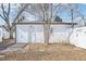 Backyard featuring outbuilding with a door and window at 1857 W Tennessee Ave, Denver, CO 80223