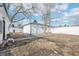 Backyard with a detached garage and a privacy fence at 1857 W Tennessee Ave, Denver, CO 80223