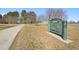 Entrance to Huston Lake Park with a paved path and grassy areas at 1857 W Tennessee Ave, Denver, CO 80223