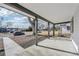 Covered porch featuring concrete flooring and painted support posts at 1857 W Tennessee Ave, Denver, CO 80223