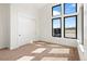 Bright bedroom with carpet and large window at 5741 Doc Bar Circle, Larkspur, CO 80118