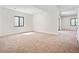 Bright room with neutral carpet and natural light at 5741 Doc Bar Circle, Larkspur, CO 80118