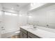 Clean bathroom, featuring a bathtub, toilet and modern vanity at 13352 E 110Th Way, Commerce City, CO 80022