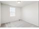 Bright and airy bedroom with carpeted floor and large window at 13352 E 110Th Way, Commerce City, CO 80022