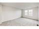 Bright bedroom with carpet and two windows at 13352 E 110Th Way, Commerce City, CO 80022