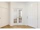 Open entryway with french doors and coat closet at 13352 E 110Th Way, Commerce City, CO 80022
