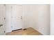 Bright entryway with white doors and wood-look flooring at 13352 E 110Th Way, Commerce City, CO 80022