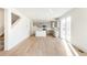 Modern kitchen with gray cabinets, an island, and stainless steel appliances at 13352 E 110Th Way, Commerce City, CO 80022