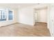 Spacious living room with hardwood floors and access to the front entry at 13352 E 110Th Way, Commerce City, CO 80022