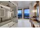 Bathroom featuring tiled shower, dual shower heads, and mountain views at 250 Sallie Barber Rd, Breckenridge, CO 80424