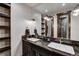 Elegant bathroom features a double vanity, granite countertop, and pendant lighting at 250 Sallie Barber Rd, Breckenridge, CO 80424