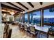 Open floor plan dining room with mountain views and wood beam ceiling at 250 Sallie Barber Rd, Breckenridge, CO 80424