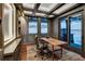 Beautiful home office featuring custom built-ins, elegant wallpaper, and a coffered ceiling at 250 Sallie Barber Rd, Breckenridge, CO 80424