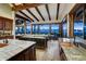 Gourmet kitchen featuring two islands and wood beamed ceilings at 250 Sallie Barber Rd, Breckenridge, CO 80424