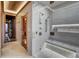 Modern shower room with glass enclosure, tiled walls and floor, bench, and mounted shower heads at 250 Sallie Barber Rd, Breckenridge, CO 80424