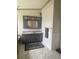 Spacious bathroom with double vanity, great mirror and gray and white tile at 47904 Dartmouth Ave, Bennett, CO 80102