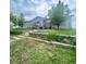 Charming single-story home featuring a front deck, well-maintained lawn, and inviting curb appeal at 47904 Dartmouth Ave, Bennett, CO 80102