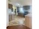 Spacious kitchen with plentiful cabinet space, modern appliances and attractive flooring at 47904 Dartmouth Ave, Bennett, CO 80102