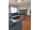 Inviting living room with a cozy fireplace and comfortable seating at 47904 Dartmouth Ave, Bennett, CO 80102