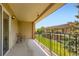 Balcony with wrought iron furniture and community view at 6727 S Race St, Centennial, CO 80122