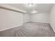Finished basement offering a spacious area with carpet and neutral colored walls at 6727 S Race St, Centennial, CO 80122