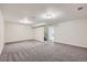 Spacious basement area with carpet, recessed lighting, and ample room for activities at 6727 S Race St, Centennial, CO 80122