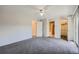 Bedroom showcasing a ceiling fan, ensuite bathroom, and a closet at 6727 S Race St, Centennial, CO 80122