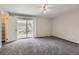 Bright bedroom with carpet, large closet and balcony access at 6727 S Race St, Centennial, CO 80122