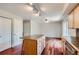 Kitchen with island, hardwood floors, and modern track lighting at 6727 S Race St, Centennial, CO 80122