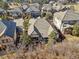 Aerial view of a neighborhood showcasing well-maintained homes and mature landscaping at 6875 Northstar Ct, Castle Rock, CO 80108