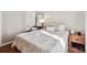 Inviting bedroom featuring a plush bed, soft textures, and natural light from the window at 6875 Northstar Ct, Castle Rock, CO 80108