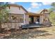 Charming home exterior showcasing stone accents, a covered patio, and professional landscaping at 6875 Northstar Ct, Castle Rock, CO 80108