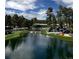 Beautiful golf course with water feature and manicured landscaping at 6875 Northstar Ct, Castle Rock, CO 80108