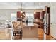 Spacious kitchen boasts a large island with seating, stainless steel appliances, and ample cabinet space at 6875 Northstar Ct, Castle Rock, CO 80108