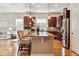 Open kitchen featuring stainless steel appliances, granite countertops and a center island with seating at 6875 Northstar Ct, Castle Rock, CO 80108