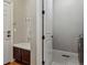 Mud room adjacent to a laundry area, featuring a built-in bench and cabinets at 6875 Northstar Ct, Castle Rock, CO 80108