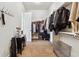 Well-organized walk-in closet with clothing racks, shelves, and carpeted flooring at 6875 Northstar Ct, Castle Rock, CO 80108