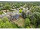 Aerial shot highlights the property's lush surroundings, peaceful setting, and convenient access to nearby amenities at 9120 W 3Rd Pl, Lakewood, CO 80226