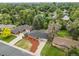 Aerial view showcases the home's well-maintained landscaping, spacious driveway, and desirable neighborhood setting at 9120 W 3Rd Pl, Lakewood, CO 80226